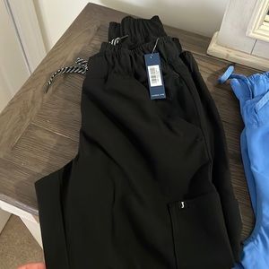 Jaanuu scrubs size small never worn 3 pairs for $100